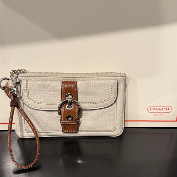 Coach Handbags - Coach Soho White Leather Wristlet with Brown Buckle Accent